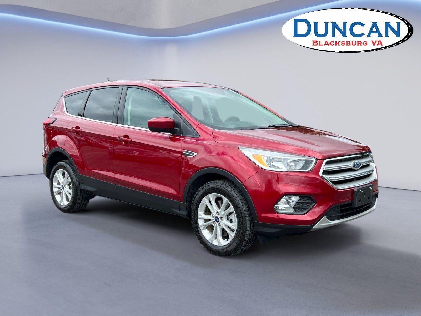 2019 Ford Escape SE in Ruby Red Metallic Tinted Clearcoat — front three-quarter view