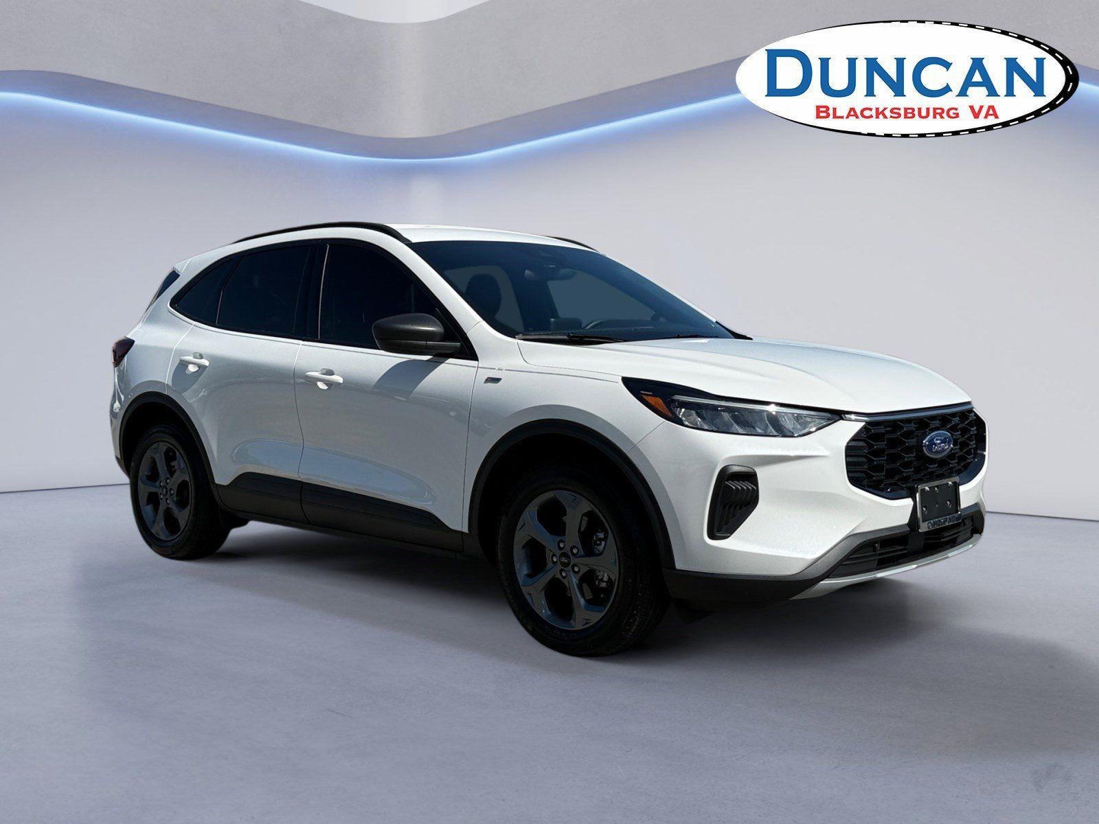 2025 Ford Escape ST-Line in Star White Metallic Tri-Coat — front three-quarter view