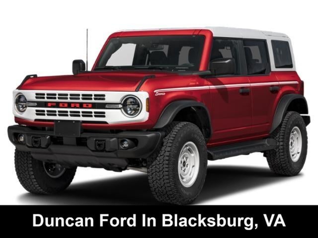 2026 Ford Bronco Heritage Edition in Ruby Red Metallic Tinted Clearcoat — front three-quarter view