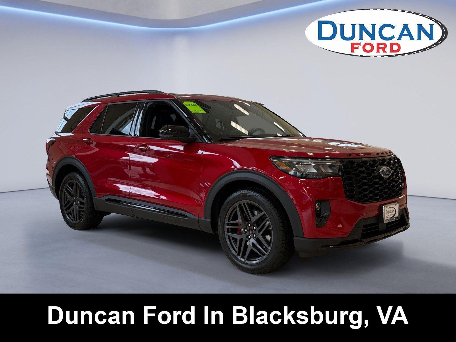 2026 Ford Explorer ST in Rapid Red Metallic Tinted Clearcoat — front three-quarter view
