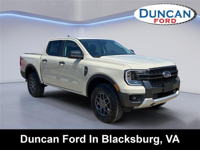2026 Ford Ranger XLT in Desert Sand — front three-quarter view