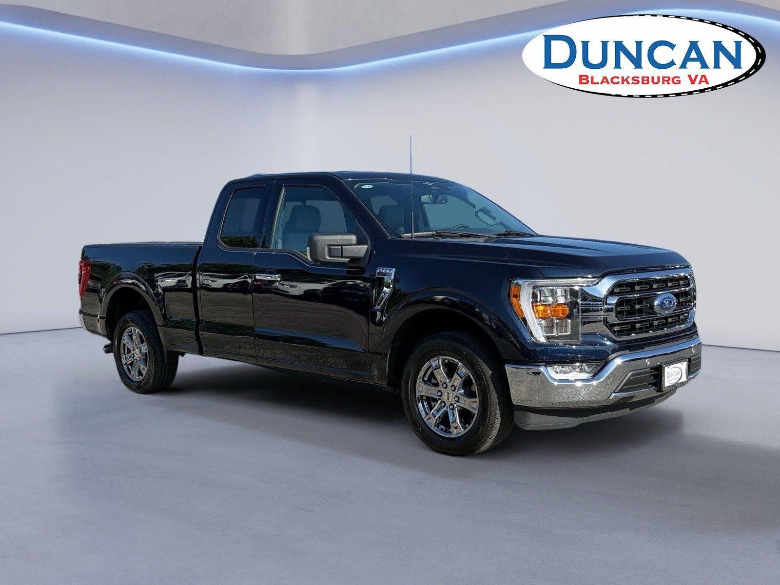 2023 Ford F-150 XLT in Antimatter Blue — front three-quarter view