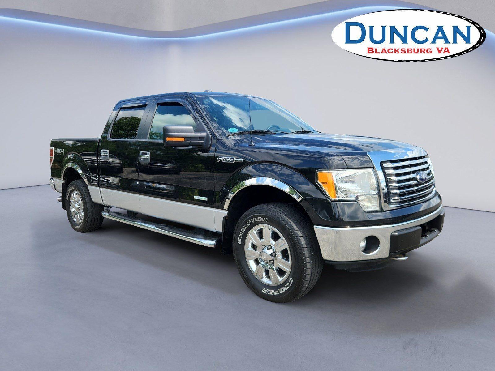 2012 Ford F-150 XLT in Tuxedo Black Metallic And Ingot Silver Metallic — front three-quarter view