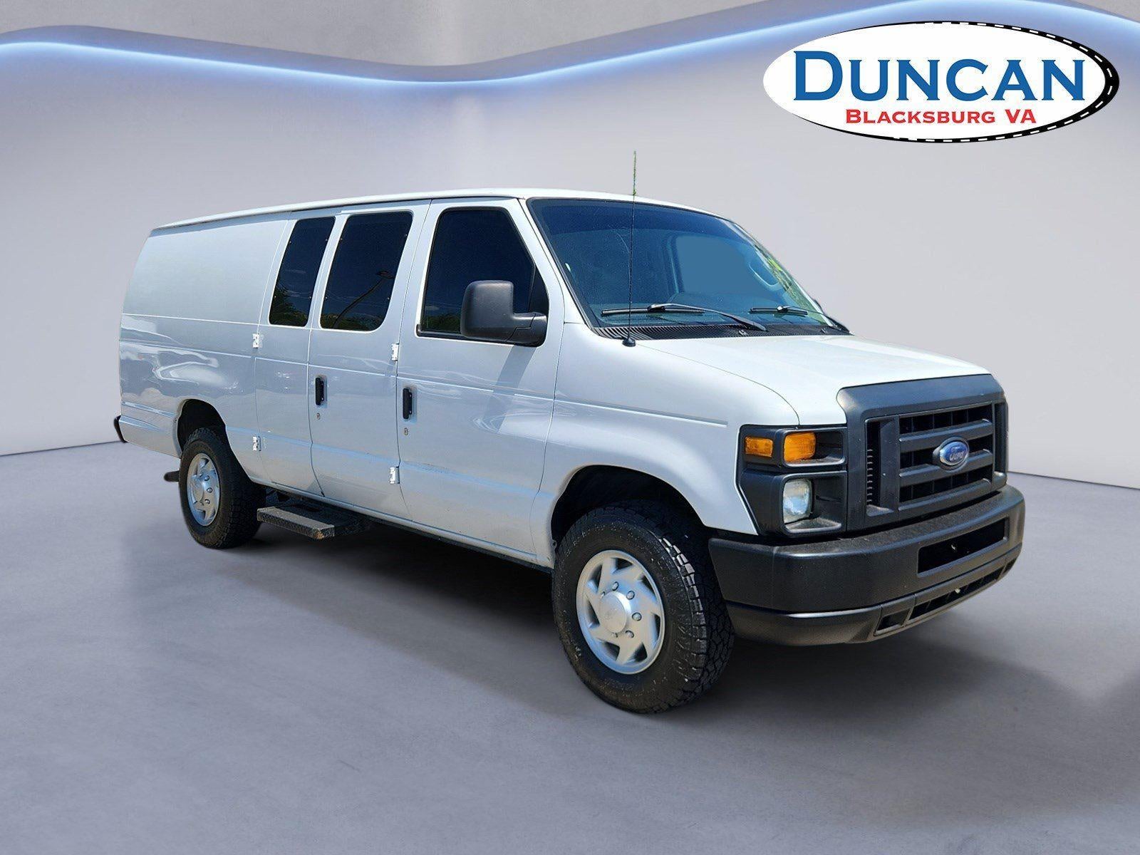 2011 Ford E-Series E-350 SD in Oxford White — front three-quarter view