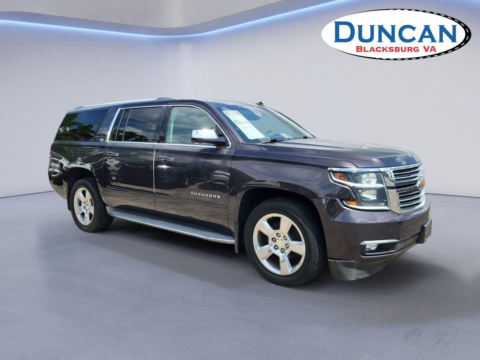 2015 Chevrolet Suburban LTZ in Black — front three-quarter view