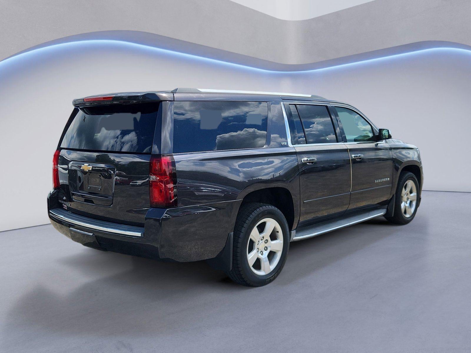 2015 Chevrolet Suburban — rear three-quarter view