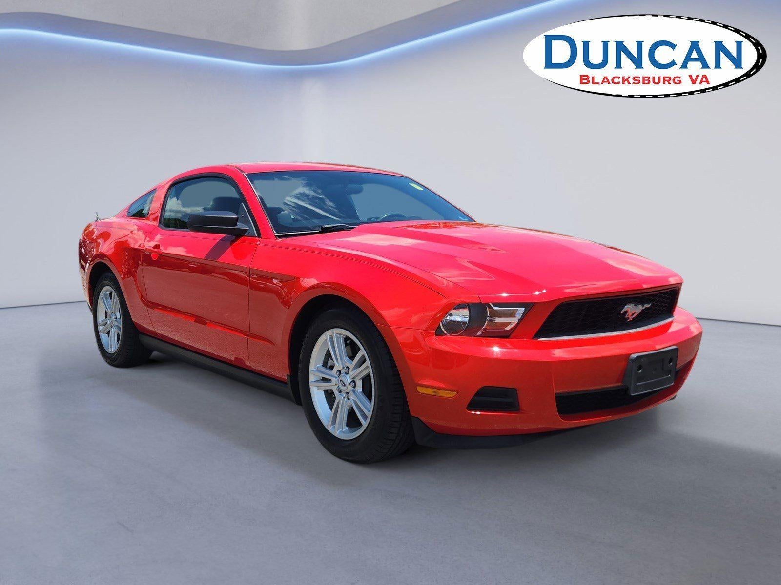 2012 Ford Mustang V6 in Race Red — front three-quarter view