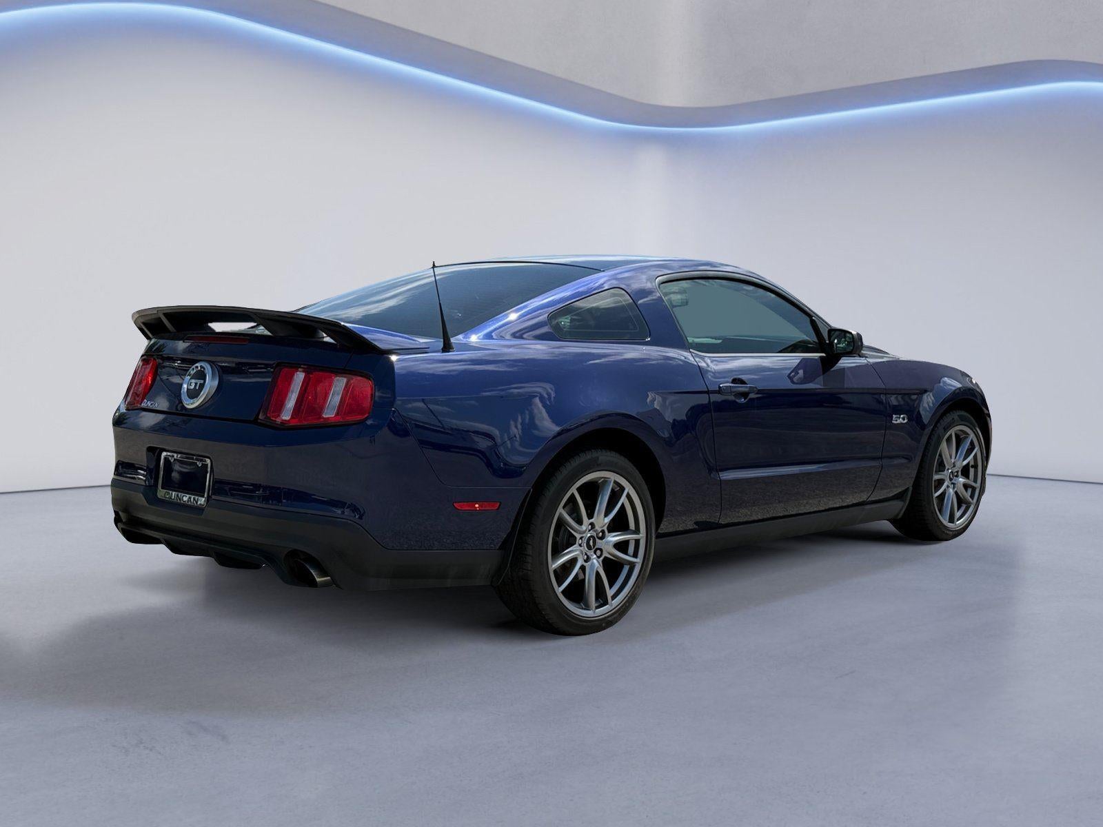 2011 Ford Mustang — rear three-quarter view