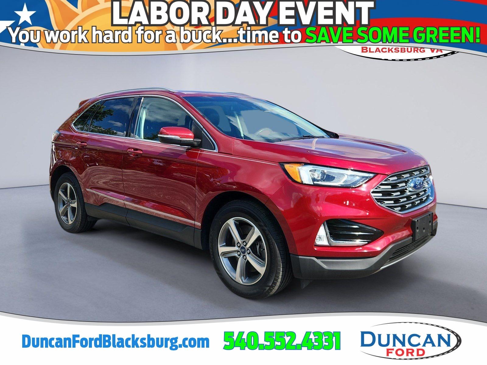 2019 Ford Edge SEL in Ruby Red Metallic Tinted Clearcoat — front three-quarter view