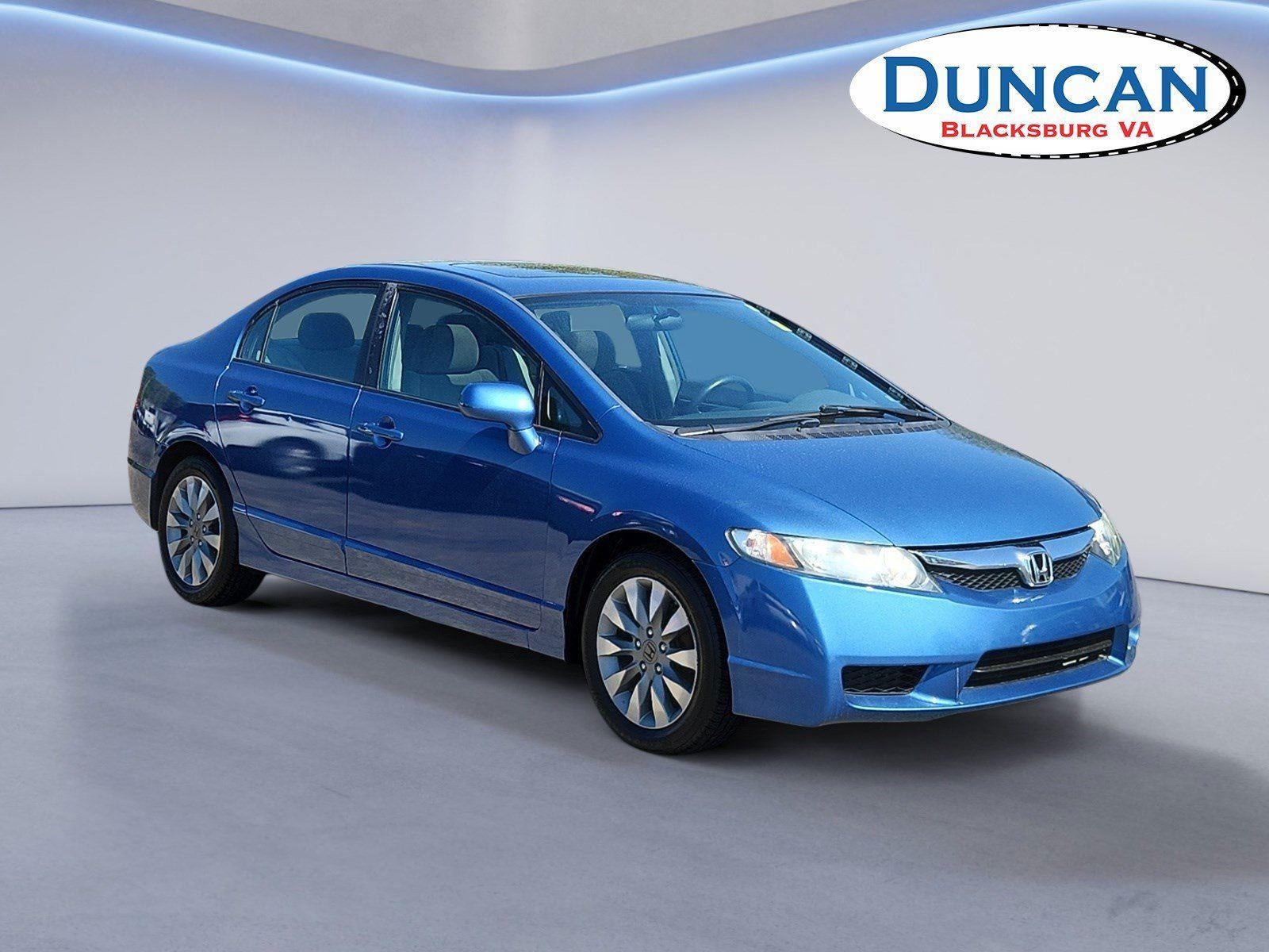 2011 Honda Civic Sdn EX in Atomic Blue Metallic — front three-quarter view