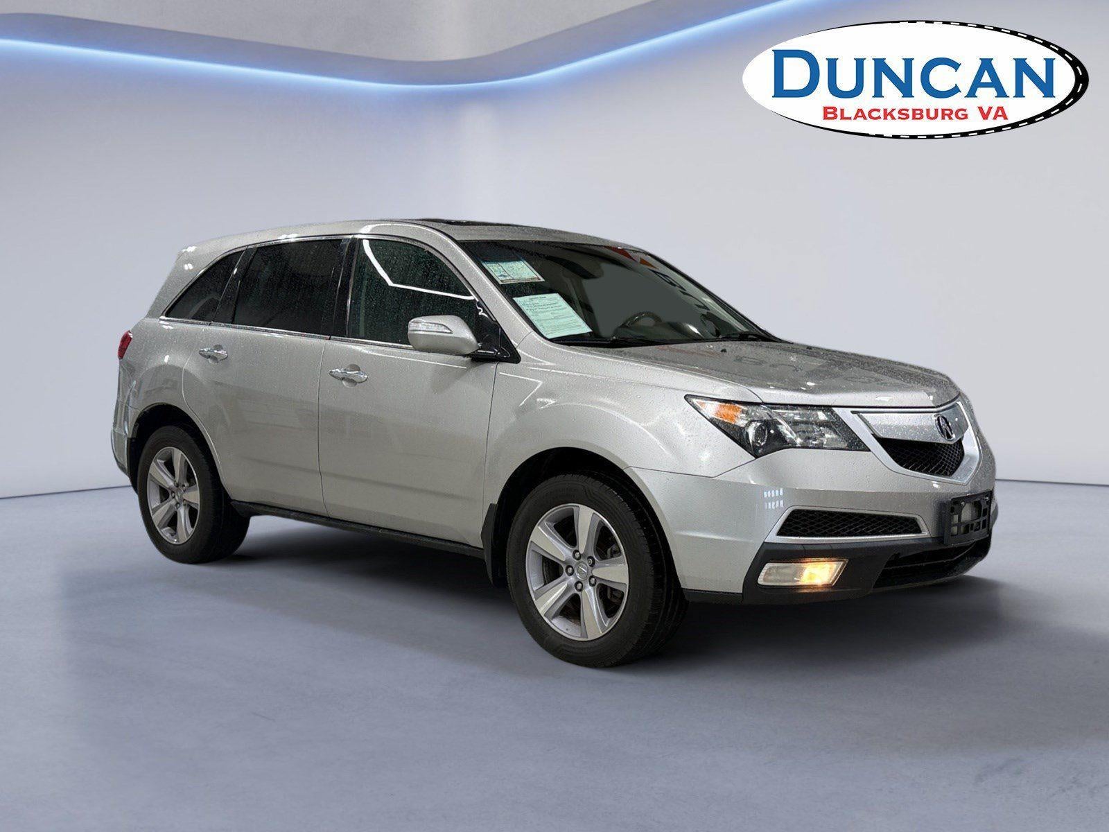 2013 Acura MDX TCPKNAV in Silver — front three-quarter view
