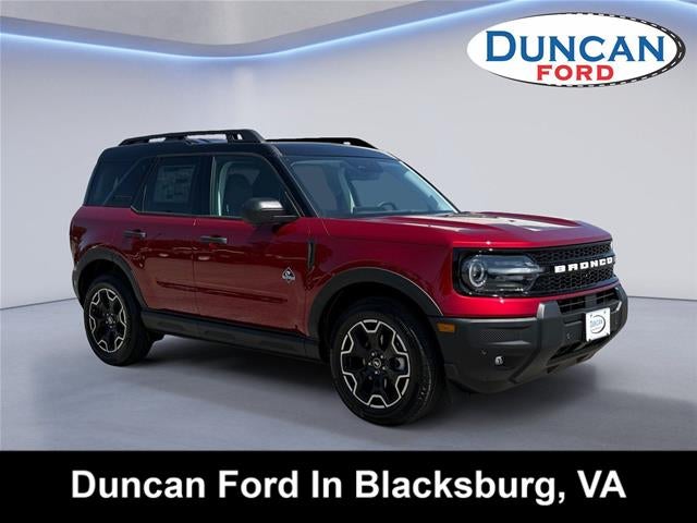 2026 Ford Bronco Sport Outer Banks in Ruby Red Metallic Tinted Clearcoat — front three-quarter view