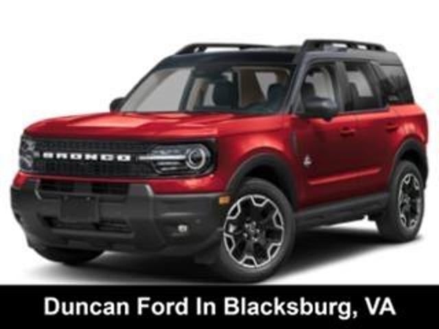 2026 Ford Bronco Sport Outer Banks in Ruby Red Metallic Tinted Clearcoat — front three-quarter view