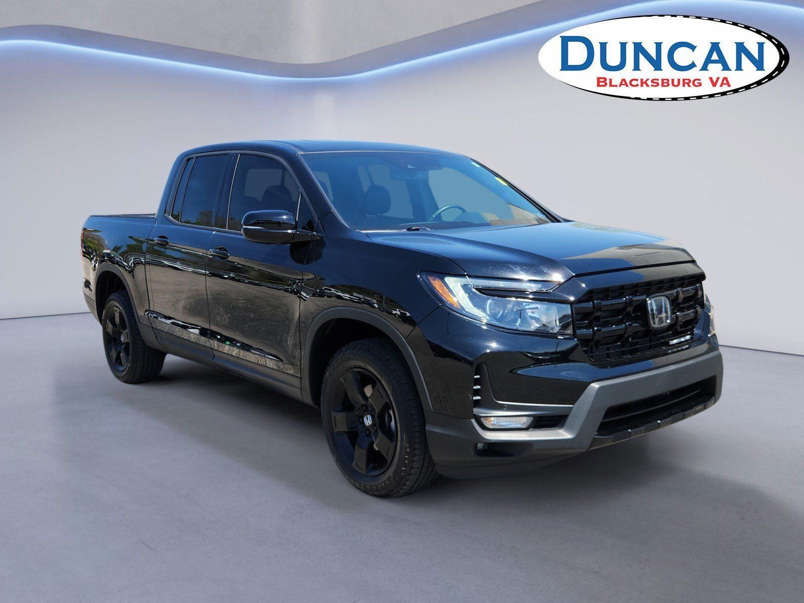 2024 Honda Ridgeline Black Edition in Crystal Black Pearl — front three-quarter view