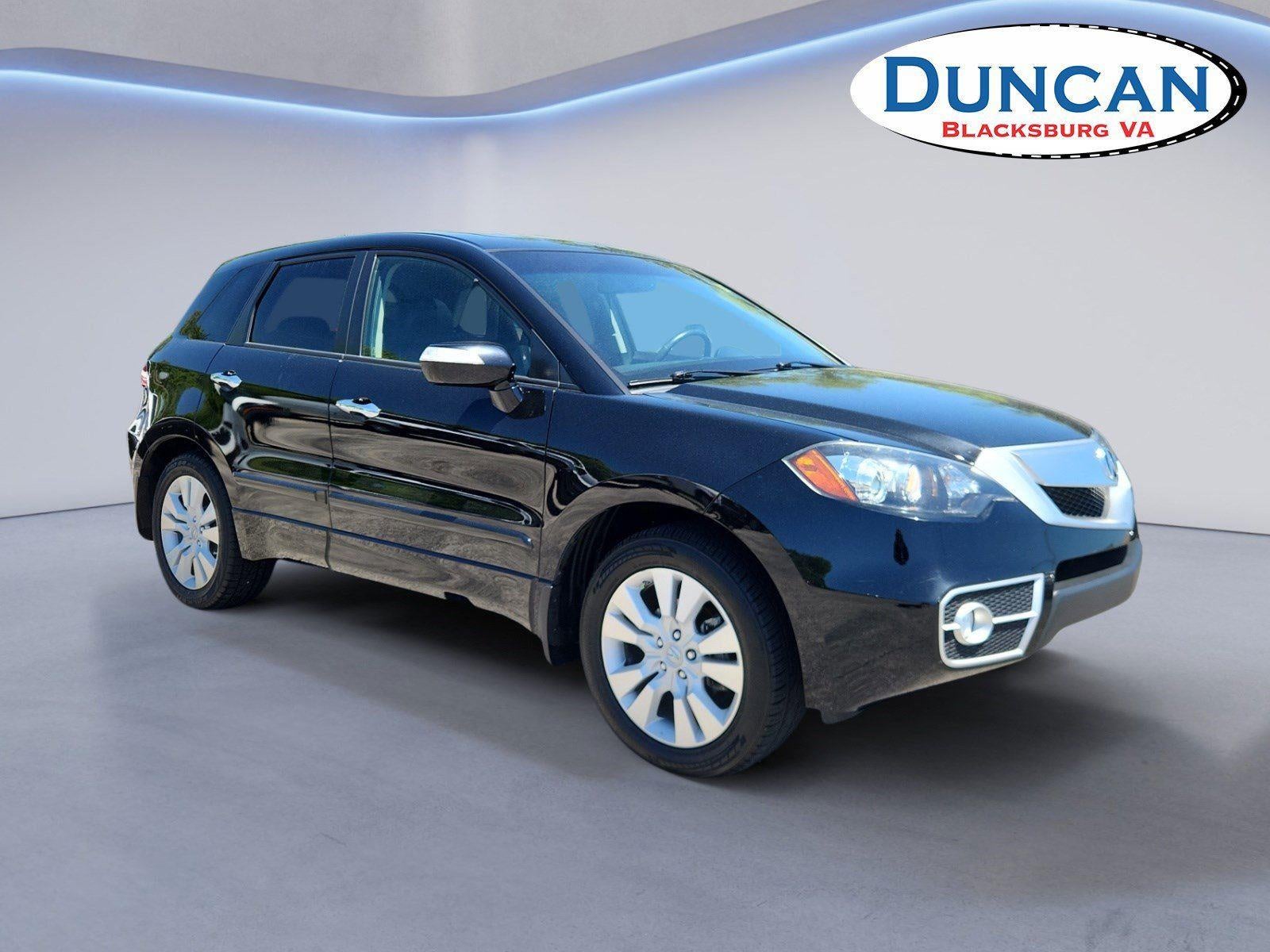 2011 Acura RDX BASE in Crystal Black Pearl — front three-quarter view