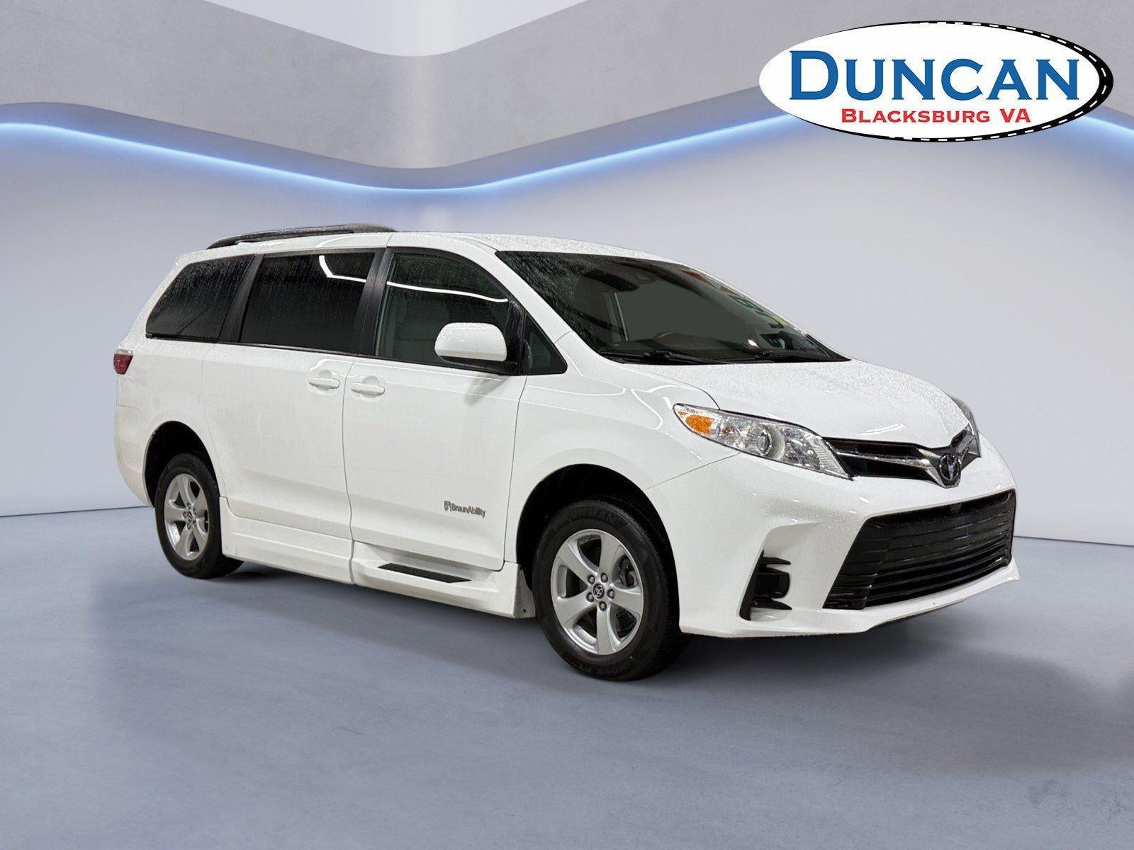 2019 Toyota Sienna LE in Super White — front three-quarter view
