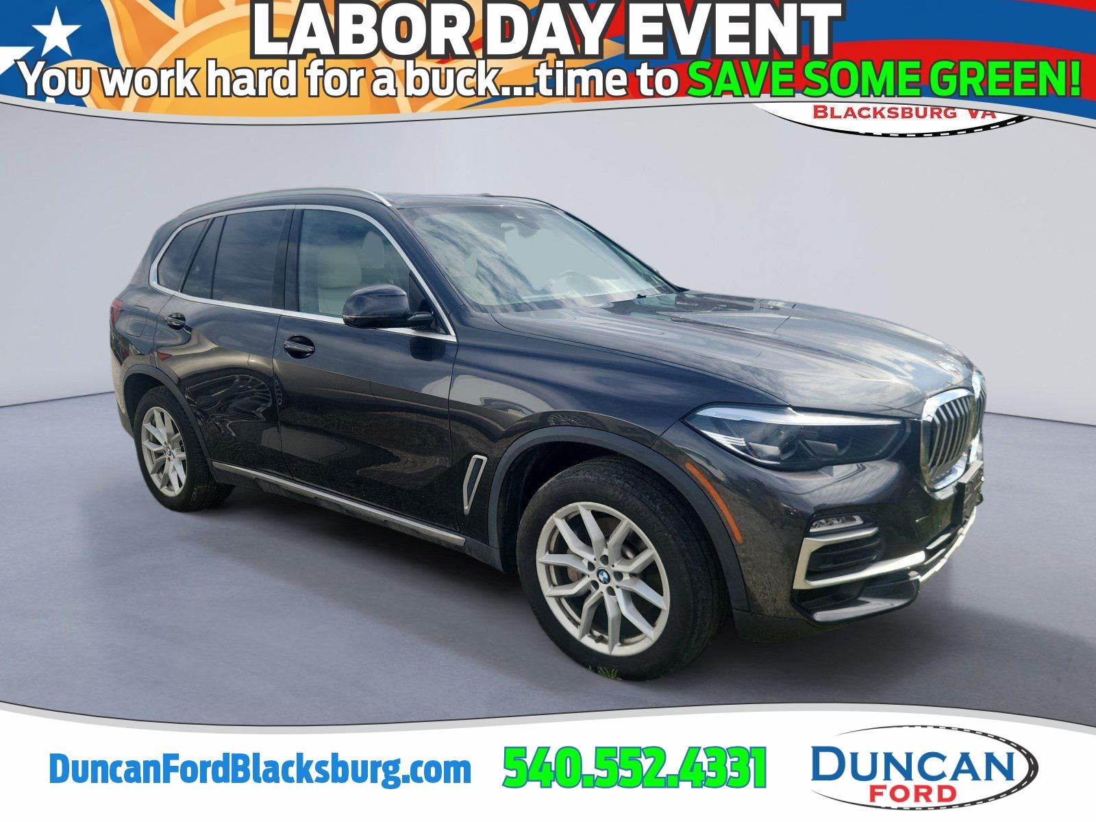 2019 BMW X5 xDrive40i in Dark Graphite Metallic — front three-quarter view