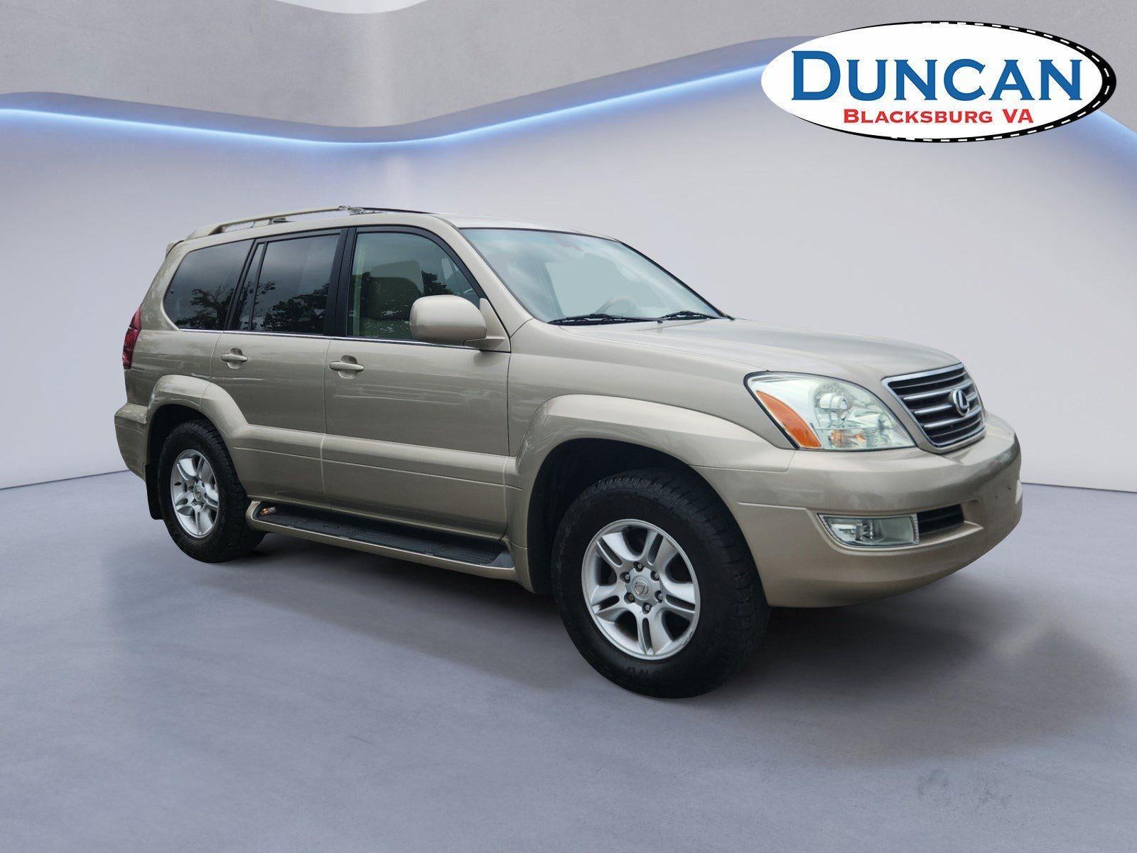 2005 Lexus GX 470 in Dorado Gold Pearl — front three-quarter view